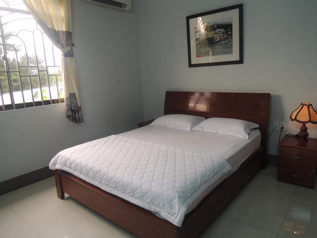 Sao Mai Hotel Cái Bè Quarto foto
