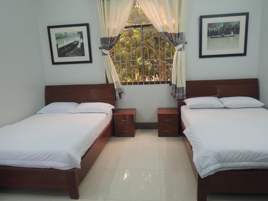 Sao Mai Hotel Cái Bè Quarto foto
