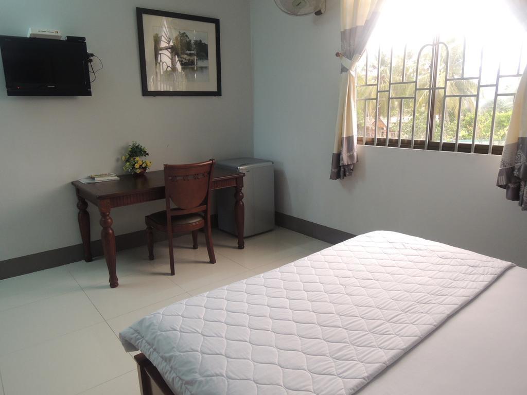 Sao Mai Hotel Cái Bè Quarto foto